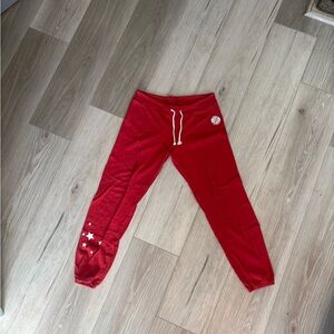 Monrow Red Peloton Sweatpants with Star Design